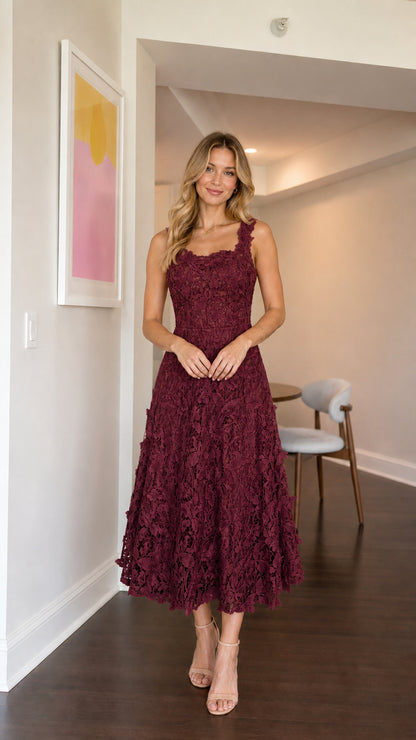 Model wearing burgundy floral lace midi dress