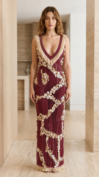 Front view of model in burgundy sequin maxi dress