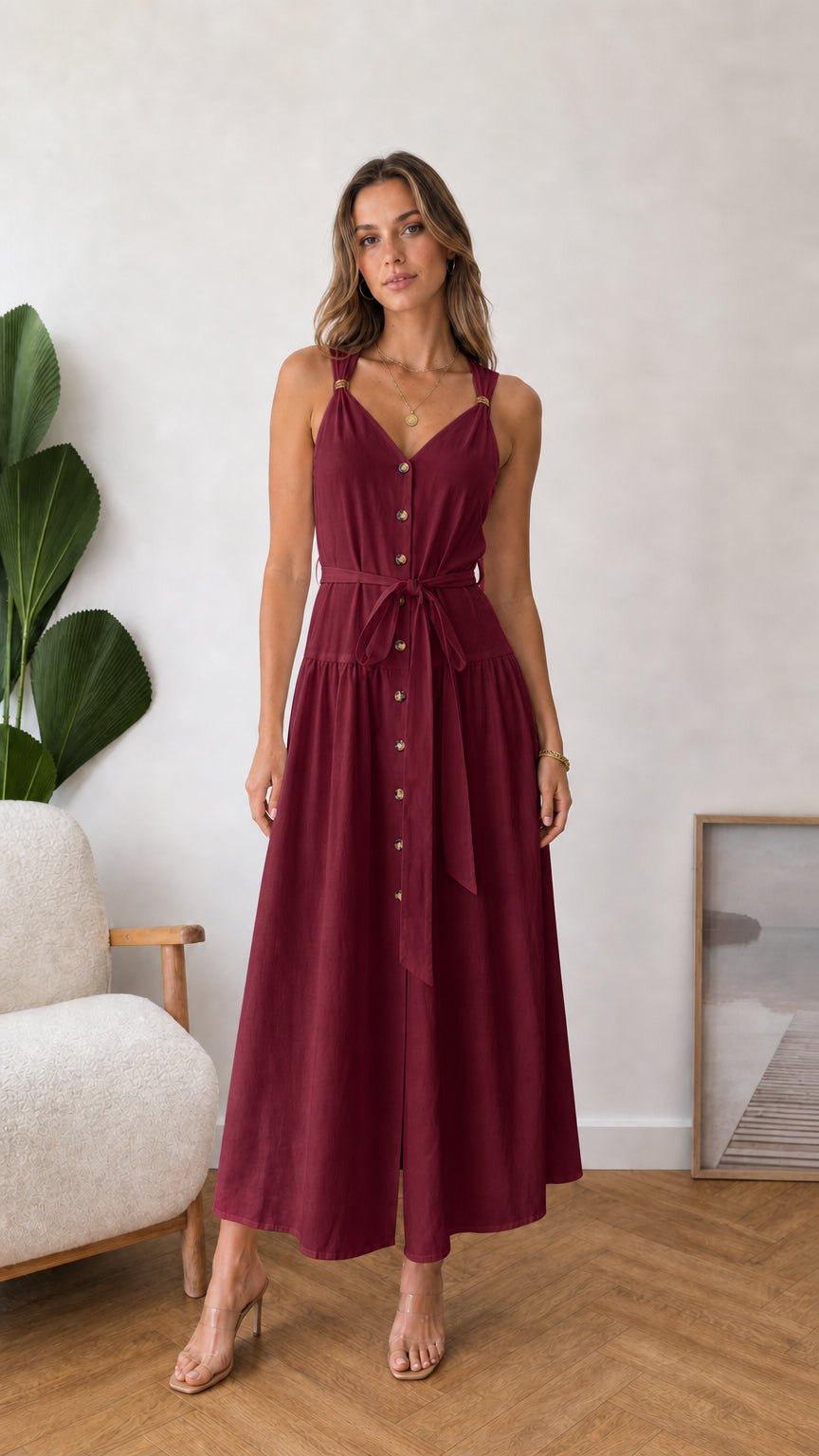 Model wearing burgundy button-front midi dress
