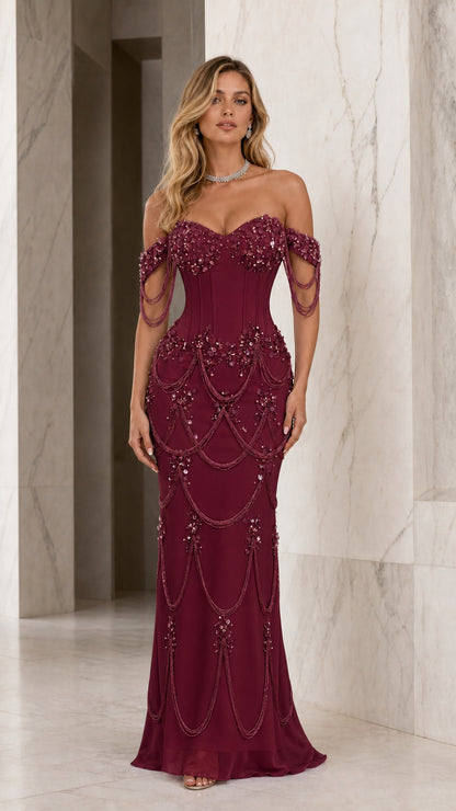 Front view of burgundy beaded corset mermaid evening dress
