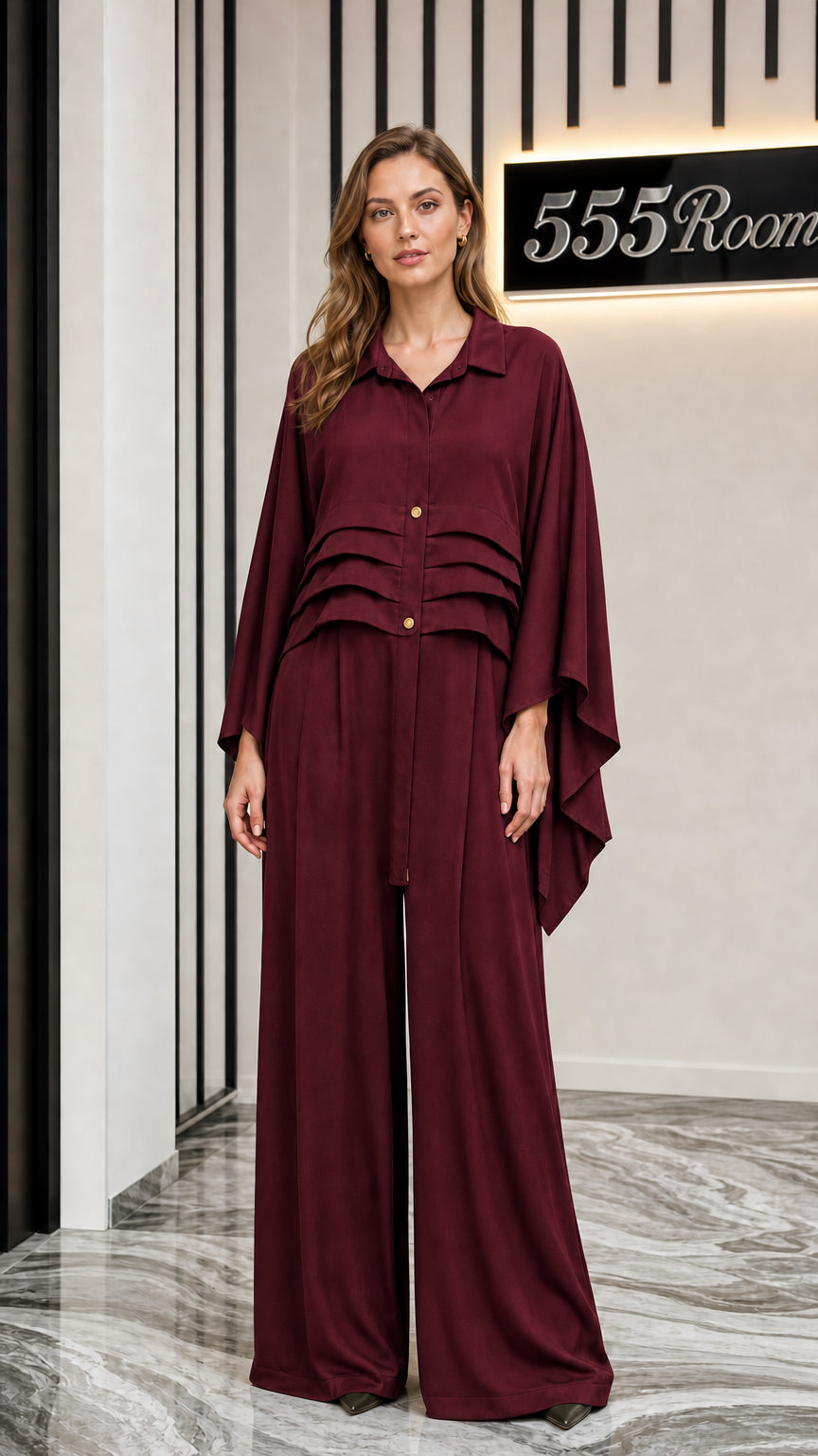 Front view of model wearing burgundy two-piece set