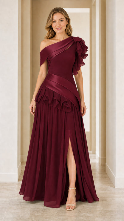 Model wearing burgundy one-shoulder evening gown
