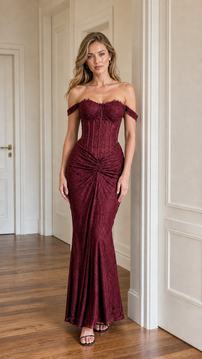 Front view of model wearing burgundy lace corset evening dress