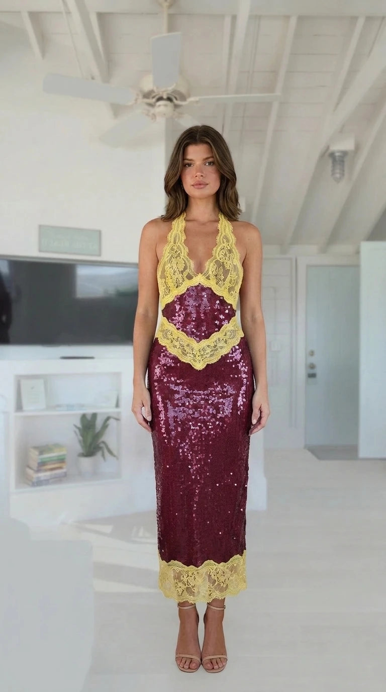Model wearing burgundy sequin midi dress with yellow lace trim