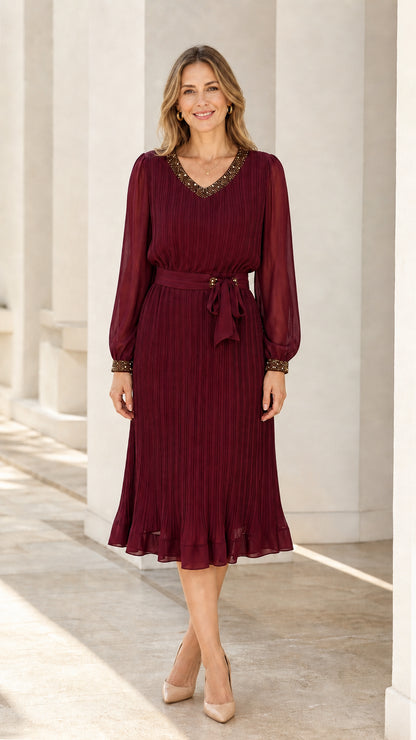 Front view of burgundy long sleeve pleated midi dress