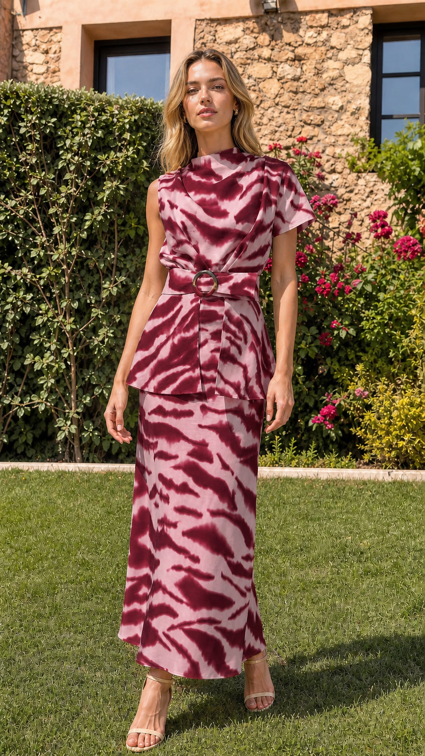 Woman wearing burgundy abstract print matching set