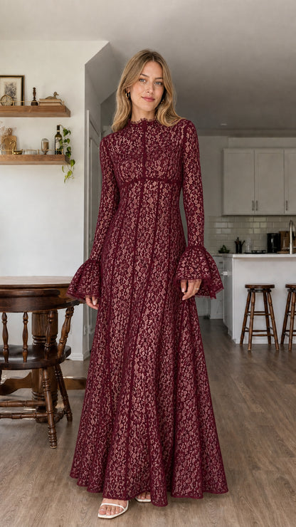 Model wearing burgundy all-over lace long sleeve maxi dress