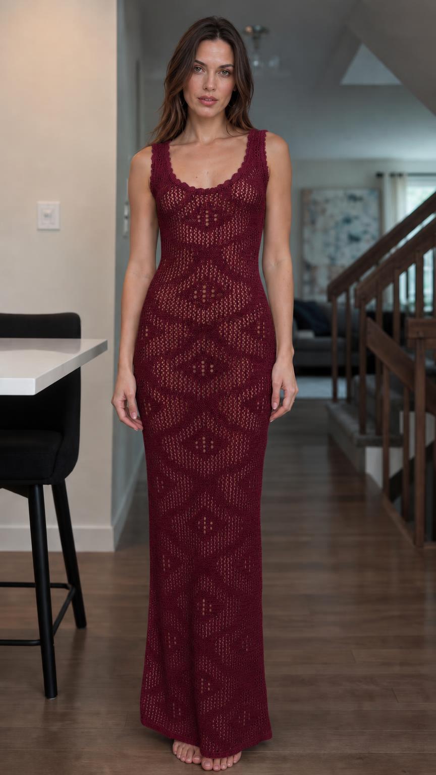 Front view of woman wearing burgundy open knit maxi dress