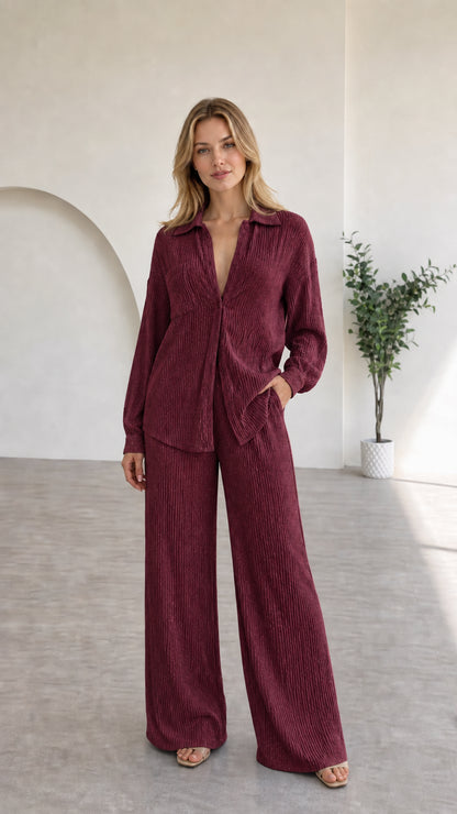 Full view of model in burgundy textured two-piece lounge set