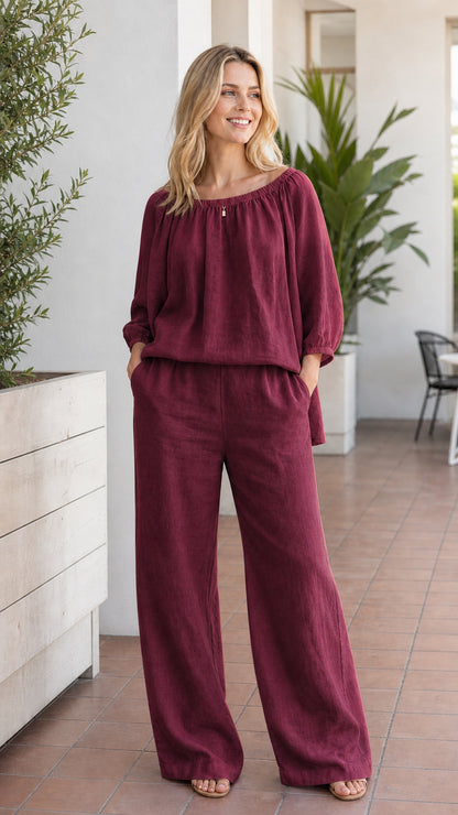 Woman wearing burgundy two-piece pant set