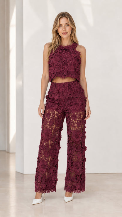 Model wearing burgundy floral lace two-piece set
