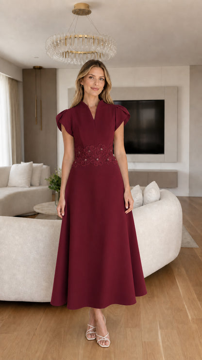 Front view of burgundy formal midi dress