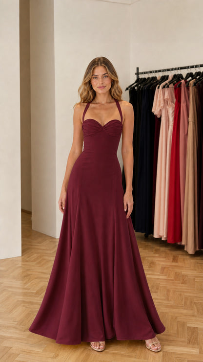 Model wearing burgundy formal maxi dress