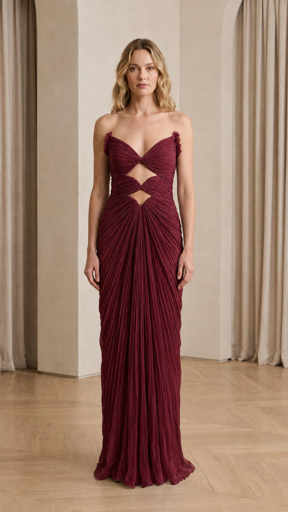 Front view of Burgundy cutout pleated evening dress