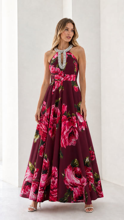Woman wearing burgundy floral long dress variant