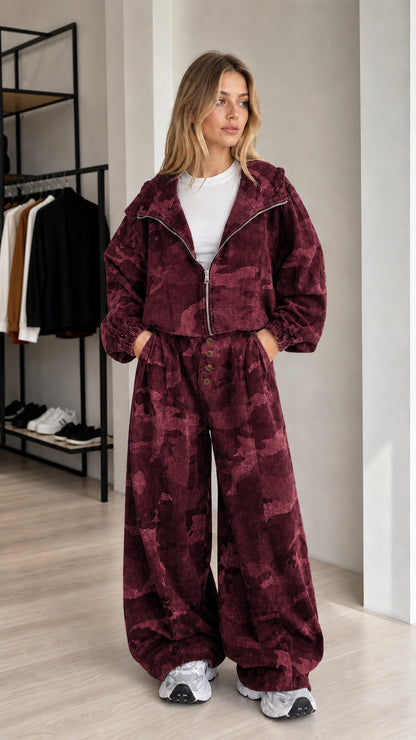 Front view of the burgundy camouflage cropped jacket and wide-leg pants set