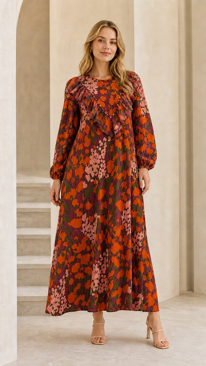 Full front view of model wearing burgundy floral long sleeve maxi dress