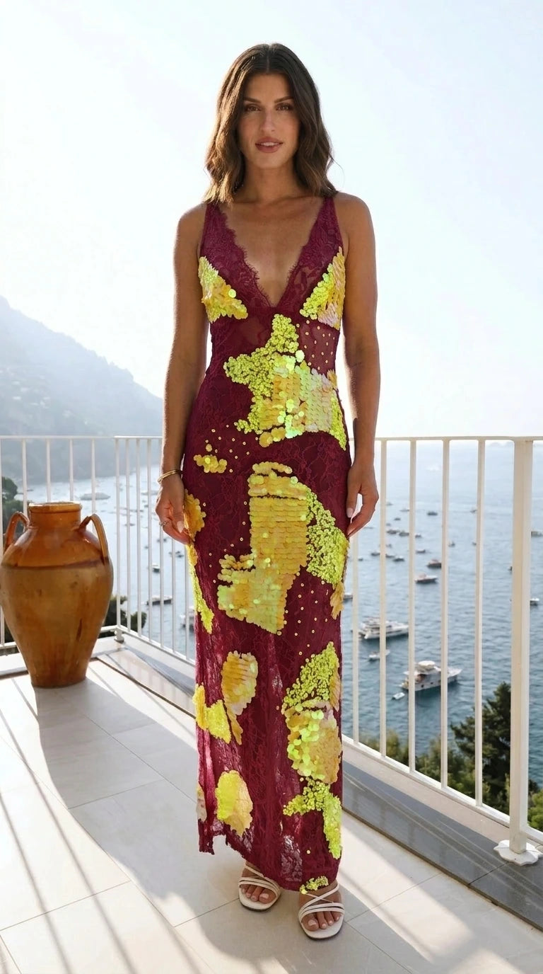 Front view of model wearing burgundy sequin lace maxi dress