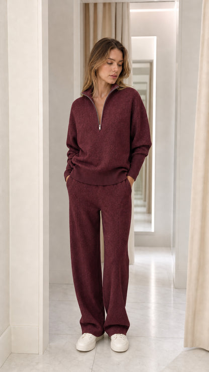 Full-length view of woman wearing burgundy two-piece knit lounge set