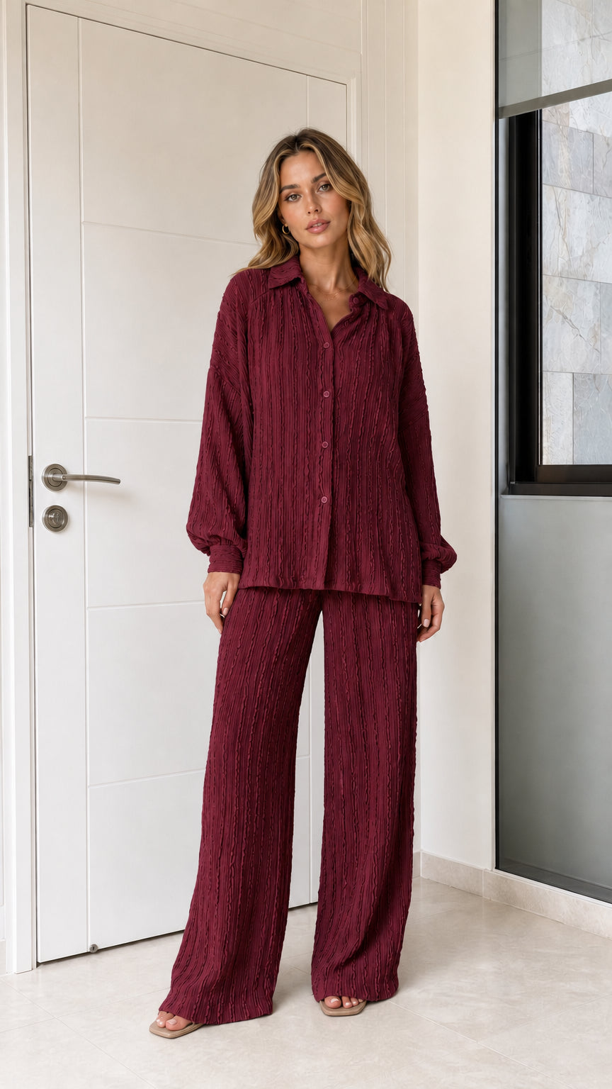 Woman wearing burgundy textured matching two-piece pant set