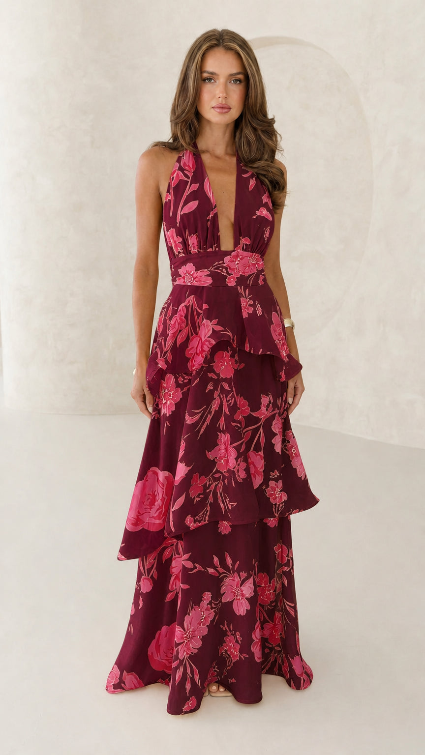 Front view of burgundy floral halter neck maxi dress