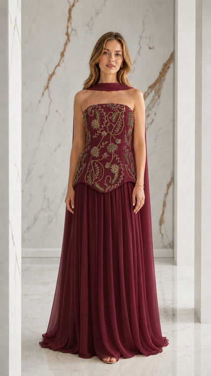 Burgundy wine strapless formal gown with embroidered corset and pleated skirt