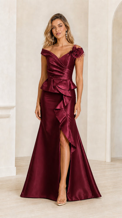 Model wearing burgundy satin evening dress