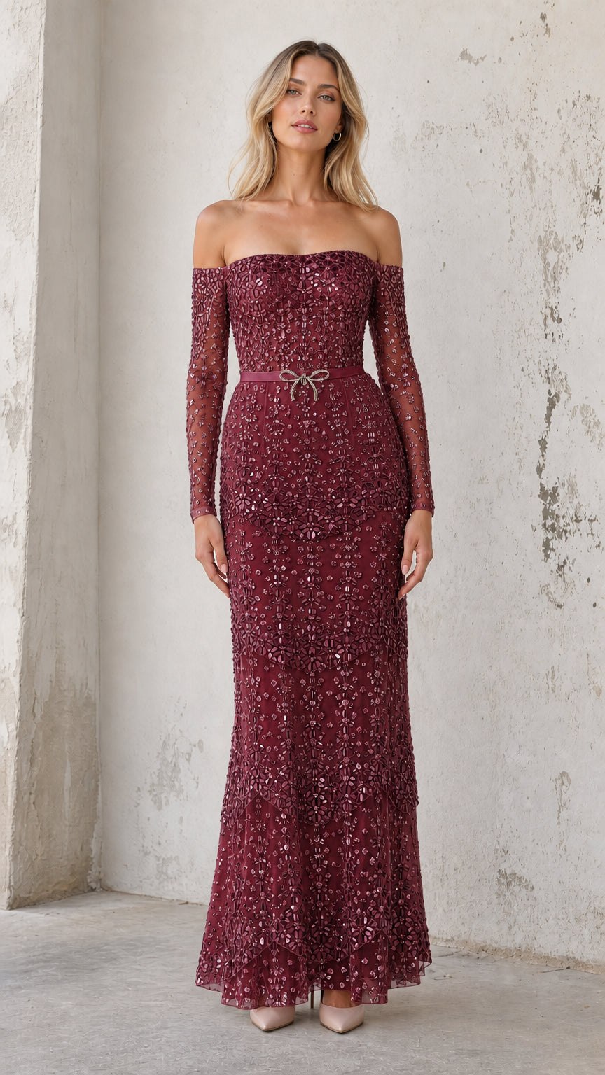 Model wearing burgundy sequin off-shoulder evening gown