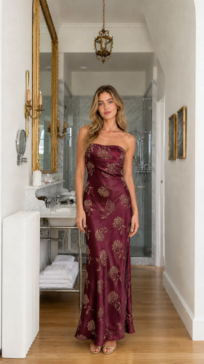 Front view of burgundy floral jacquard strapless maxi dress