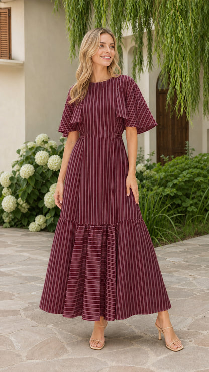Front view of model wearing burgundy striped flutter sleeve maxi dress