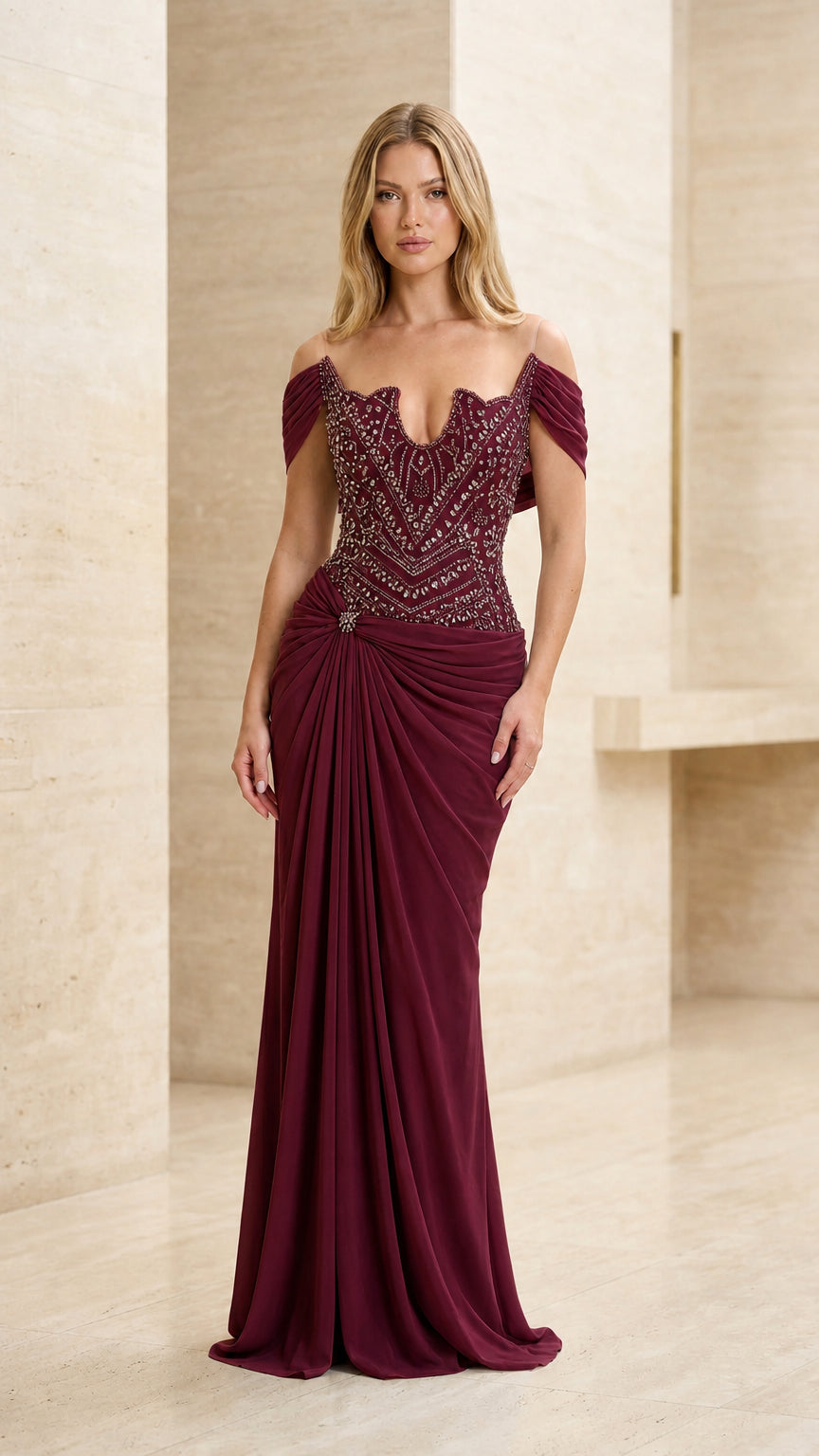 Model wearing burgundy wine beaded off-the-shoulder formal gown