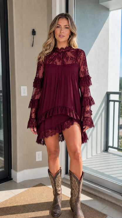 Woman wearing burgundy lace ruffle mini dress