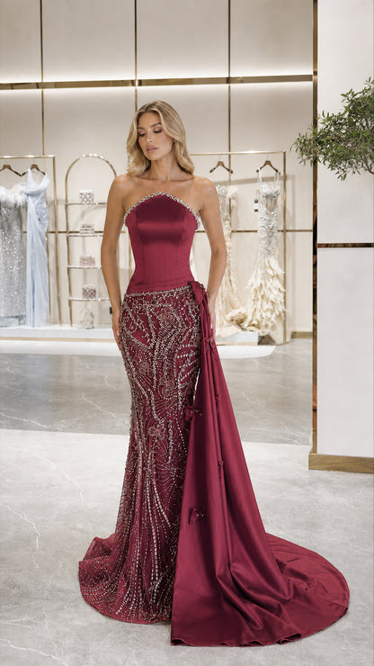 Front view of burgundy strapless sequin mermaid evening gown