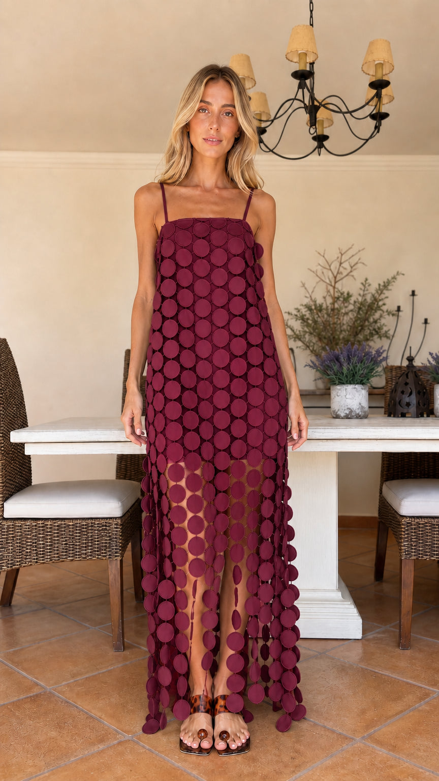 Front view of woman wearing burgundy wine circle cutout maxi dress
