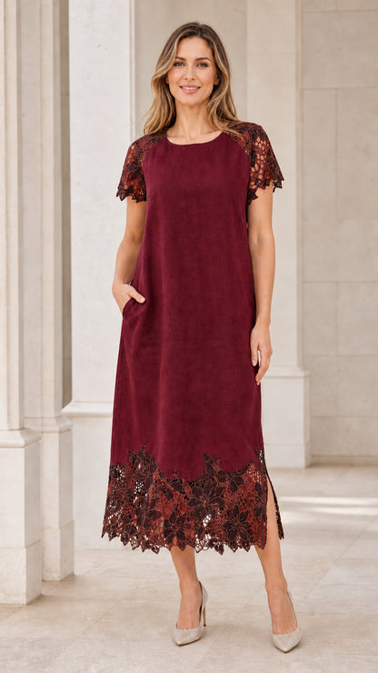 Model wearing rich burgundy midi dress with lace hem