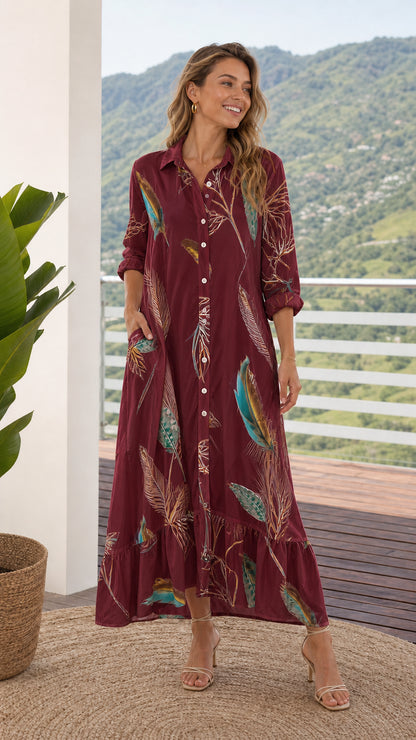 Front view of model wearing burgundy feather print maxi shirt dress