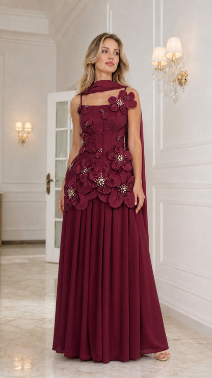 Front view of burgundy floral applique corset evening gown