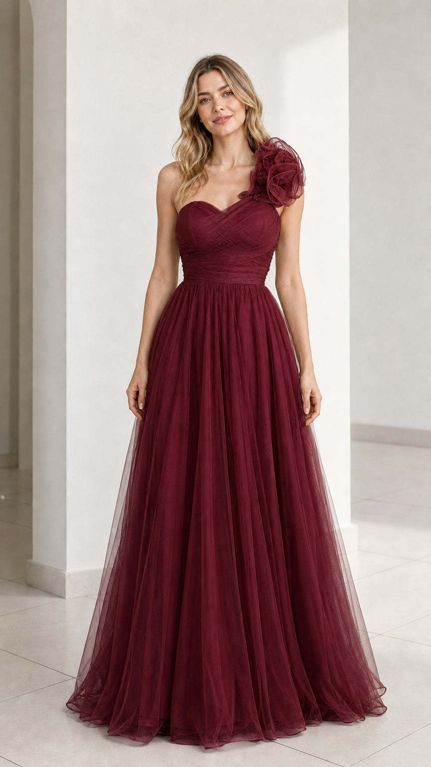 Front view of burgundy one-shoulder tulle evening gown