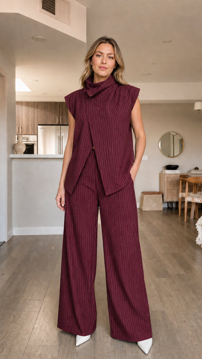 Model wearing burgundy pinstripe matching set