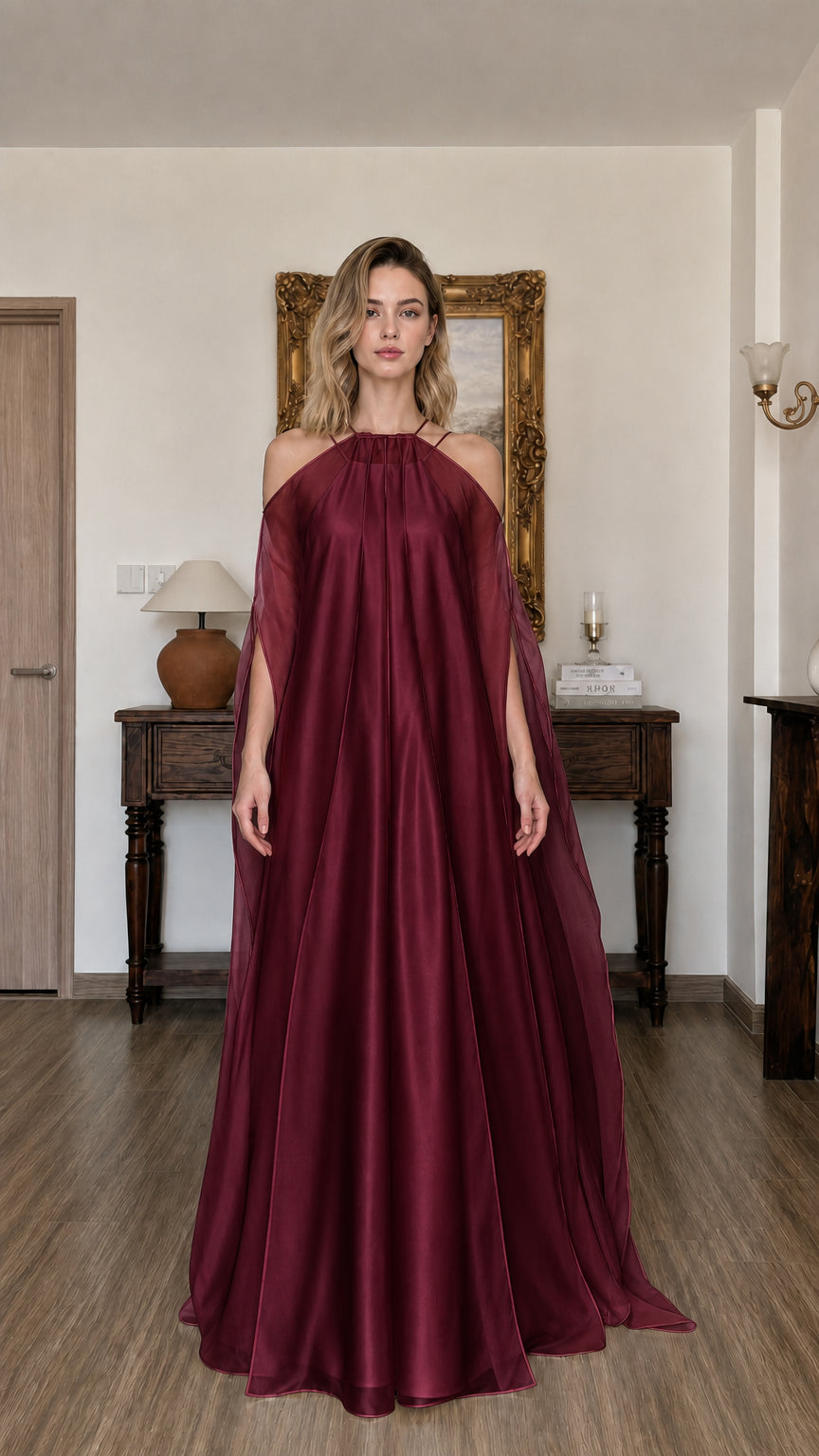 Model wearing burgundy evening maxi dress