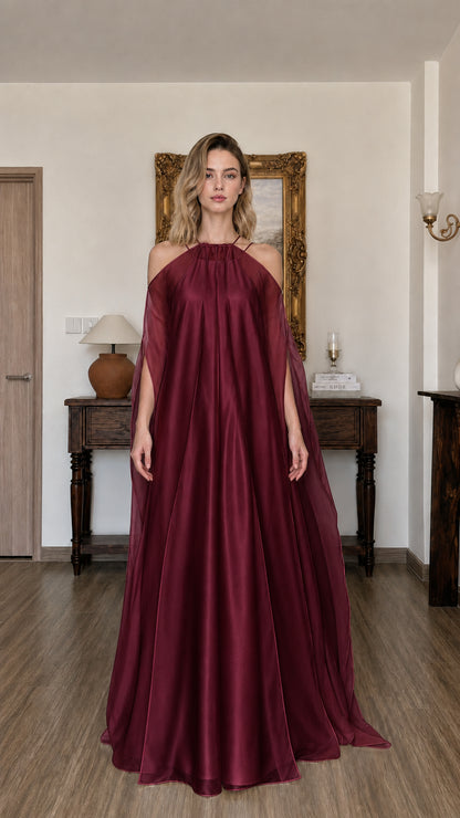 Model wearing burgundy evening maxi dress