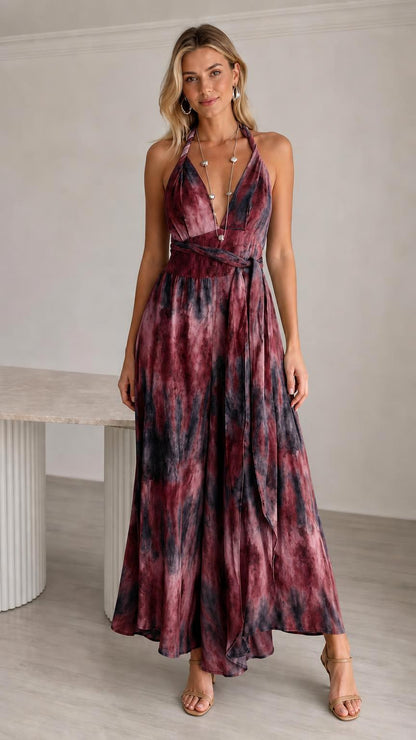 Model wearing wine tie-dye halter neck maxi jumpsuit