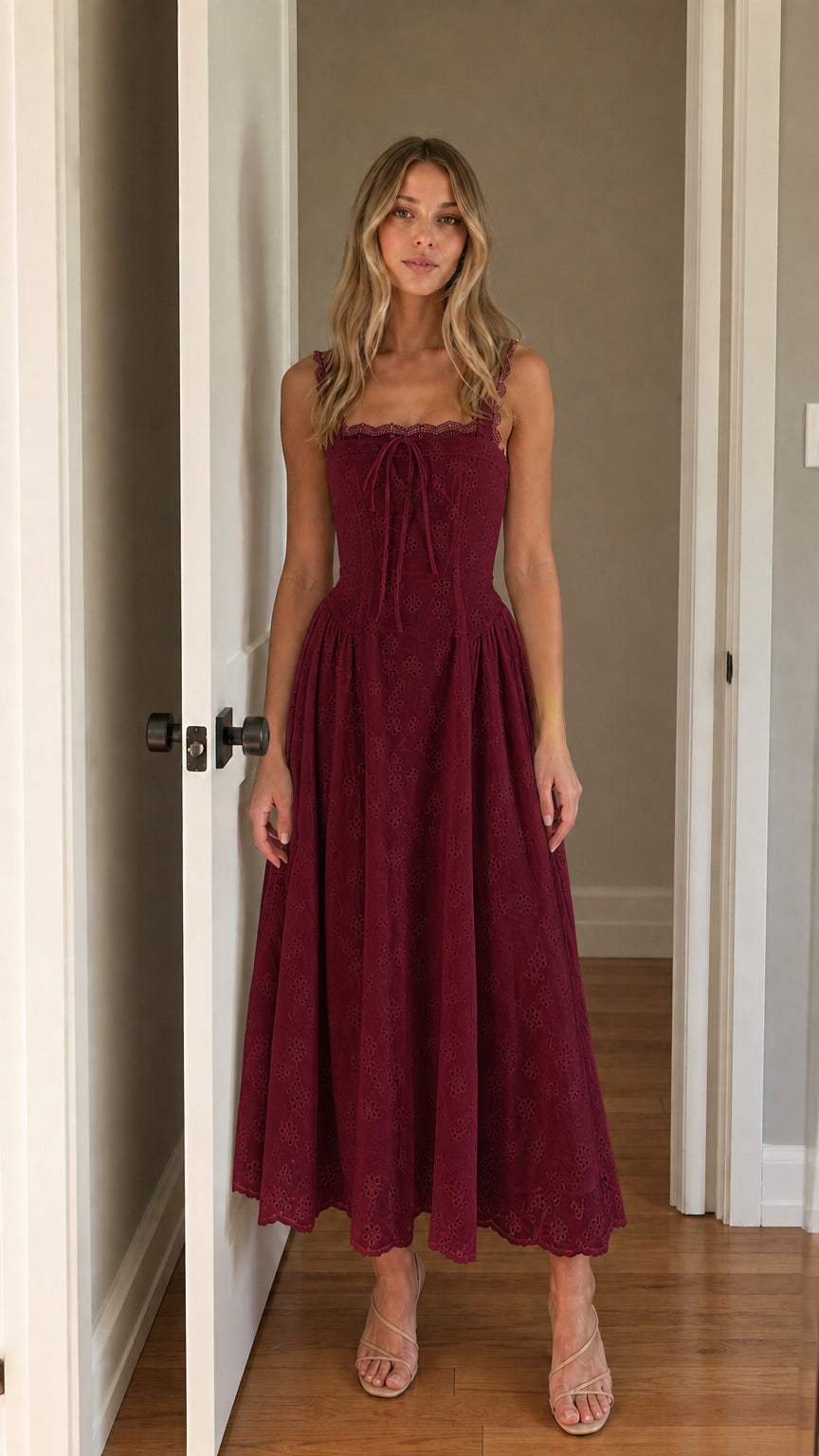 Front view of woman wearing burgundy square neck eyelet midi dress