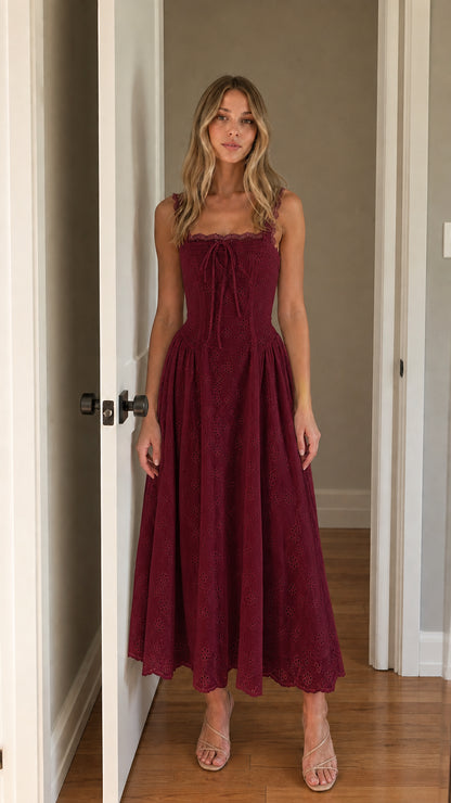 Front view of woman wearing burgundy square neck eyelet midi dress