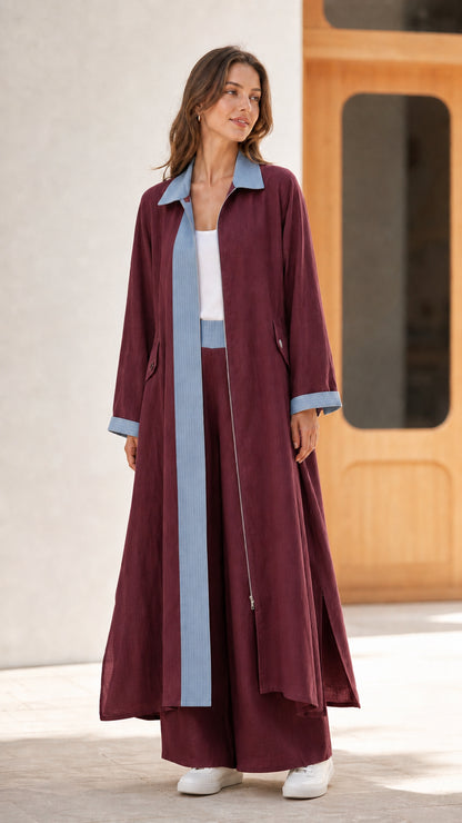Full length view of burgundy maroon two-piece set with light blue contrast placket