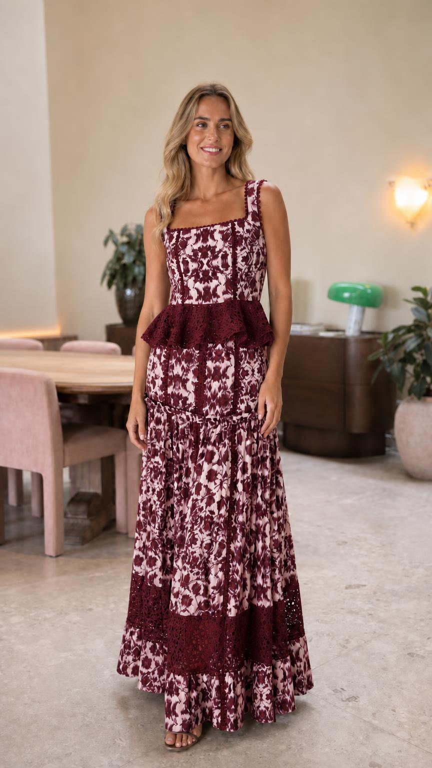 Front view of woman wearing burgundy lace trim maxi dress