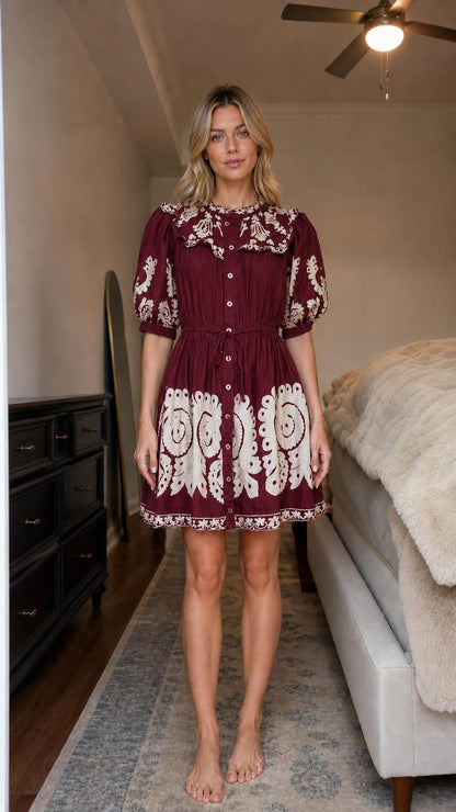 Front view of burgundy boho embroidered mini dress