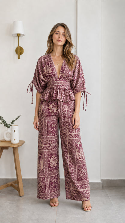 Model wearing burgundy printed two-piece set