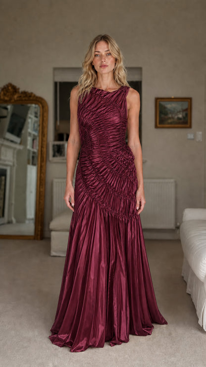 Front view of model wearing burgundy ruched maxi dress