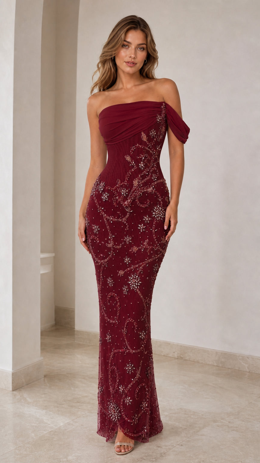 Front view of burgundy beaded evening gown